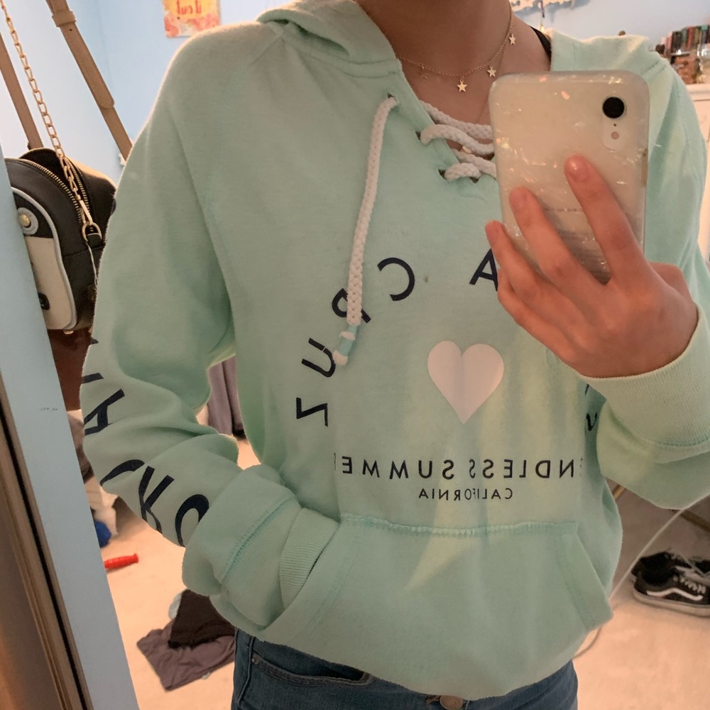 A cute mint green hoodie!